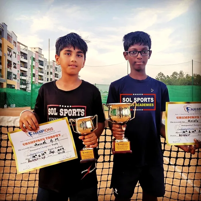 Sol Sports player with trophy