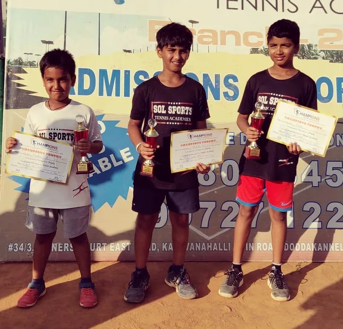 Sol Sports player with trophy