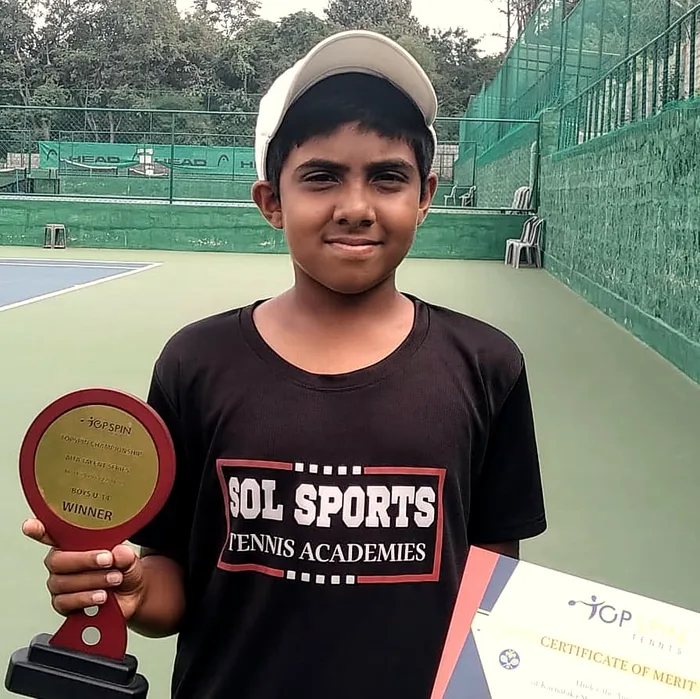 Sol Sports player with trophy