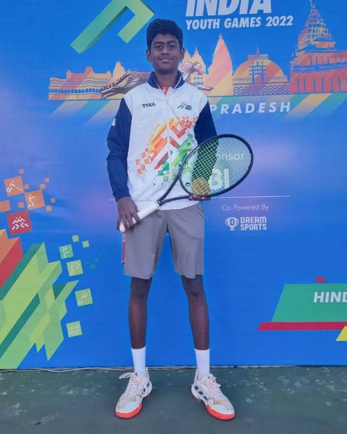 Sol Sports player with trophy